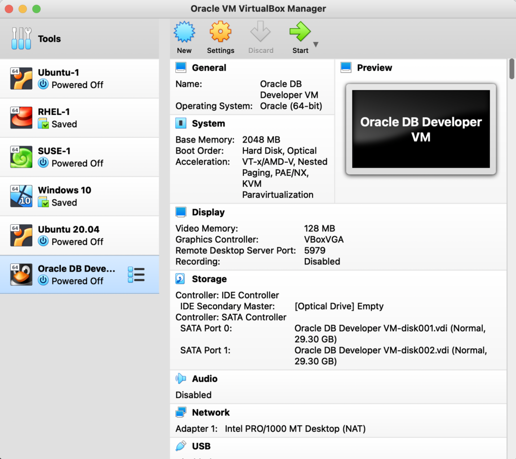 Screenshot of VirtualBox with the Oracle DB Developer VM highlighted